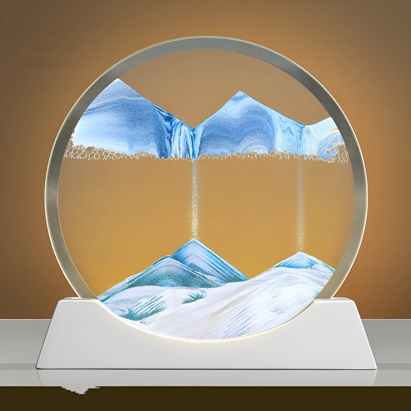 Rotating quicksand painting inside a modern 12-inch glass night lamp on a desktop