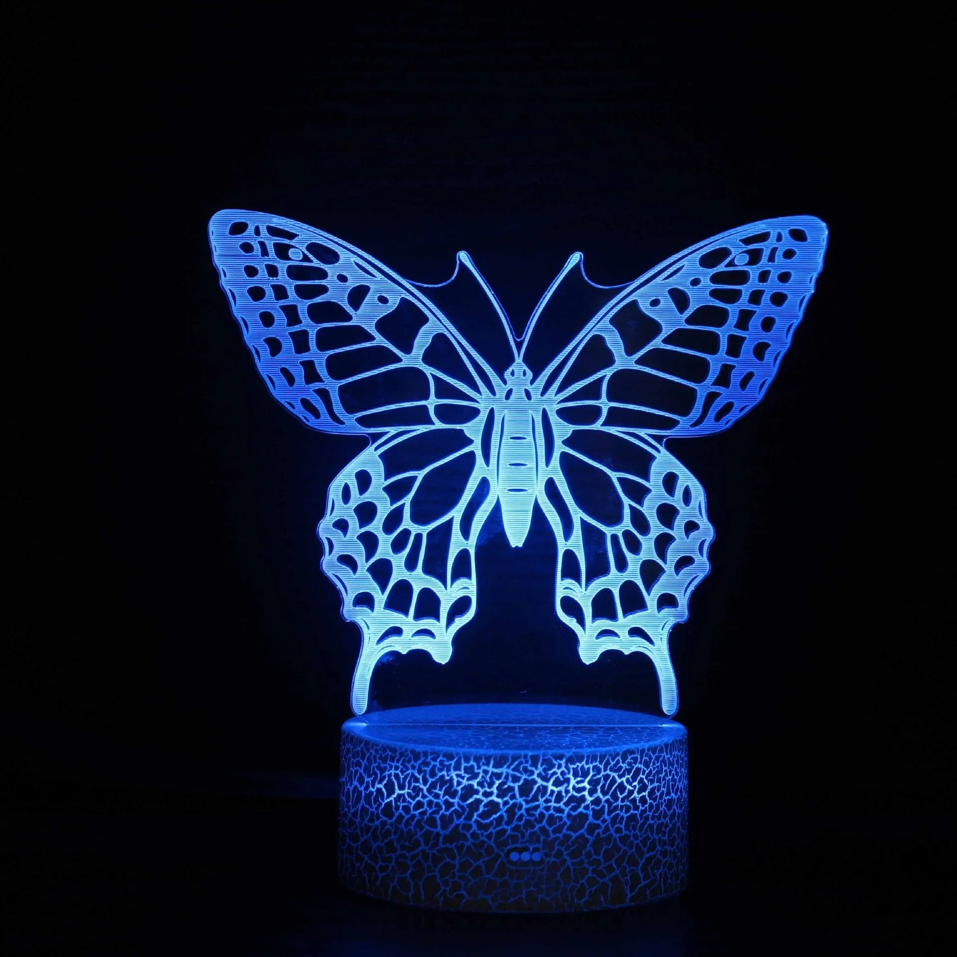 Colourful acrylic 3D touch USB table lamp with ABS base on a desk