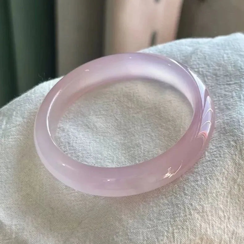 Natural agate wide tyre bracelet in 10mm width showing pink stone variant with size marking
