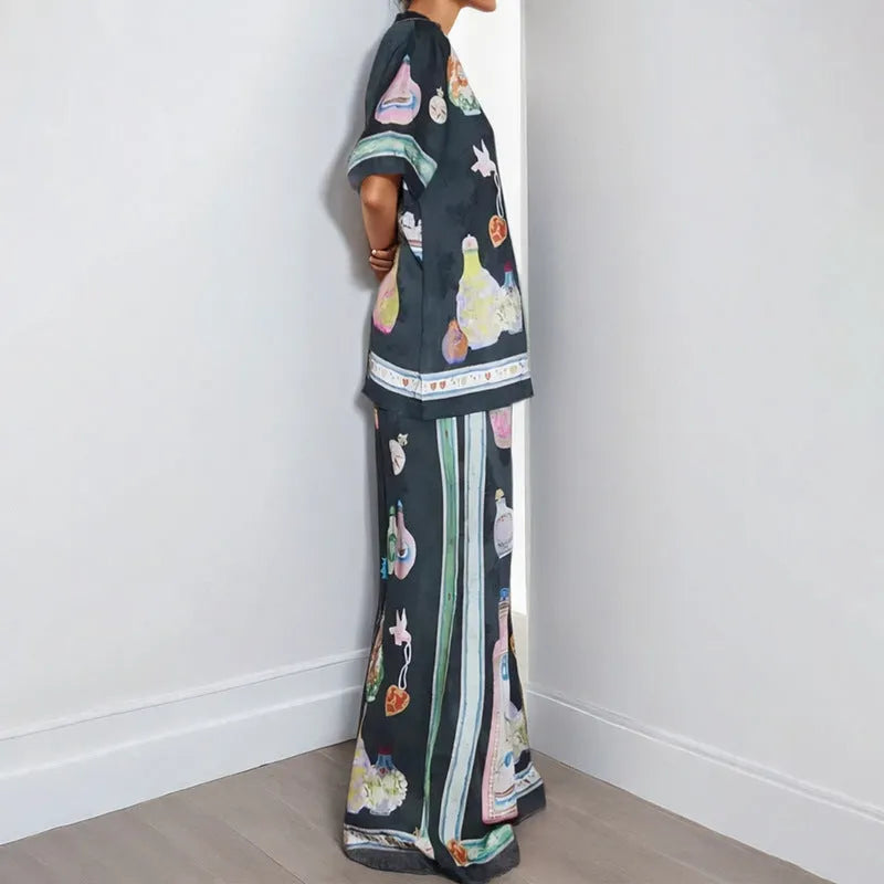 Black women's cardigan and pants set with cartoon animation pattern