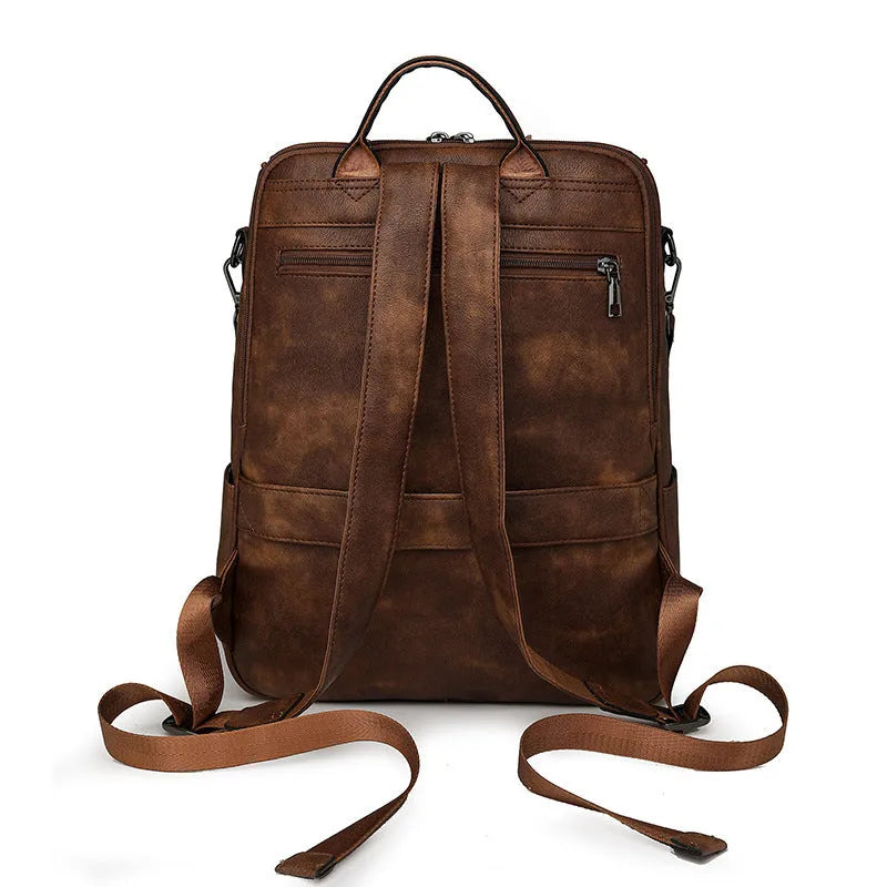 Retro college backpack in black with curved shoulder straps and stitching details