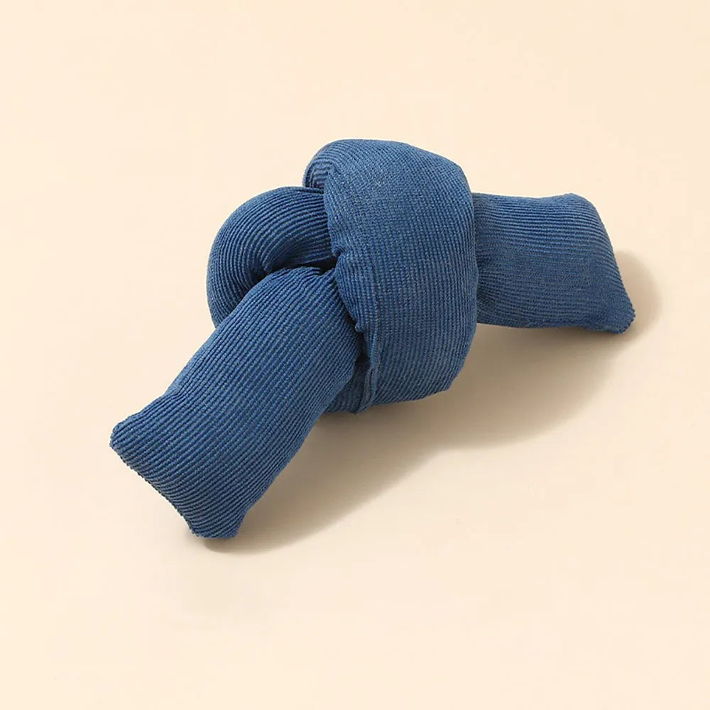 White cotton knotted rope bone dog toy for tug of war and chewing.