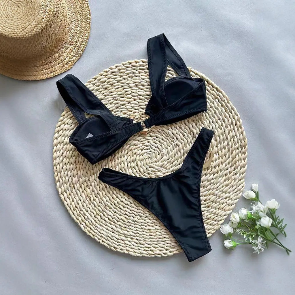 Women's black nylon printed bikini swimsuit set, front view, showing top and bottom pieces
