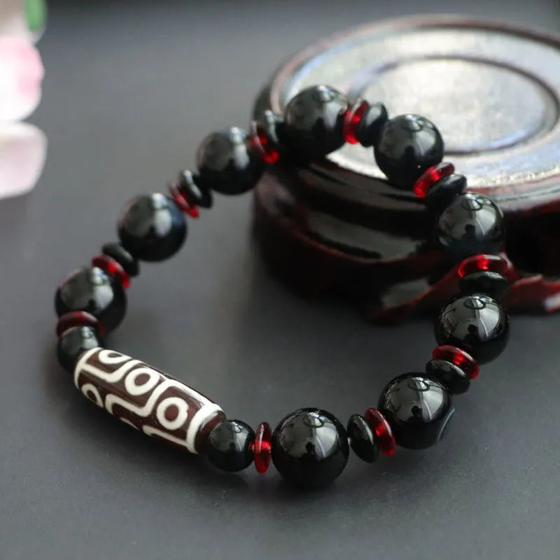 Black agate Dzi bead bracelet with hand-woven treatment and geometric national style design