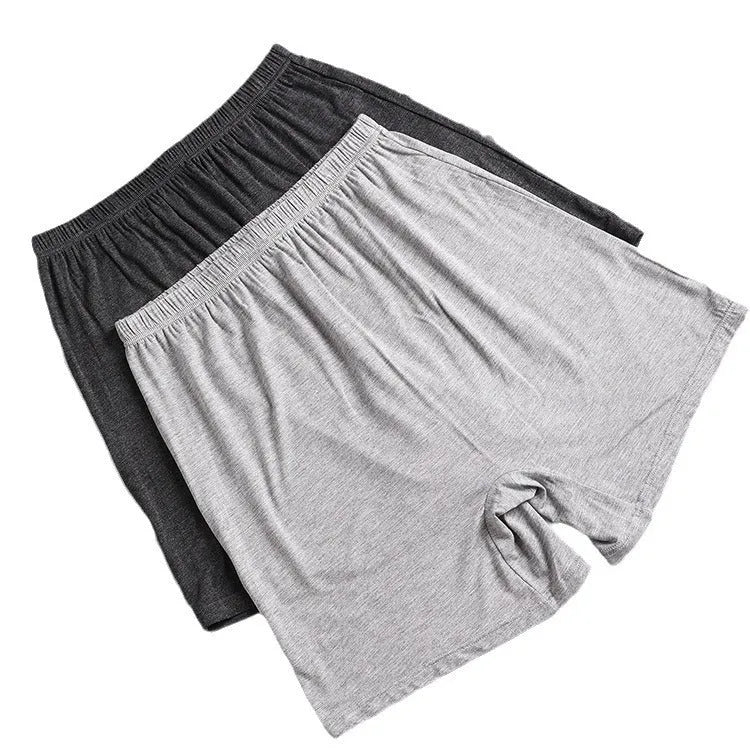 Men's solid colour modal boxers showing high waist design available in black, blue, gray and brown