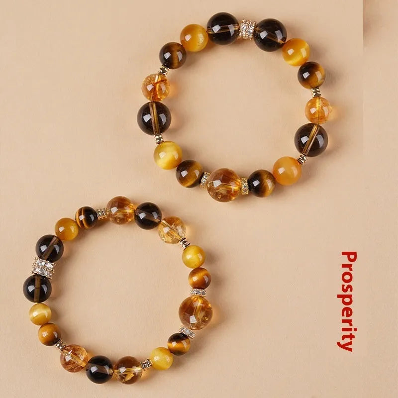 Natural yellow tiger-eye crystal bracelet in geometric tower design showing 10mm and 12mm size options