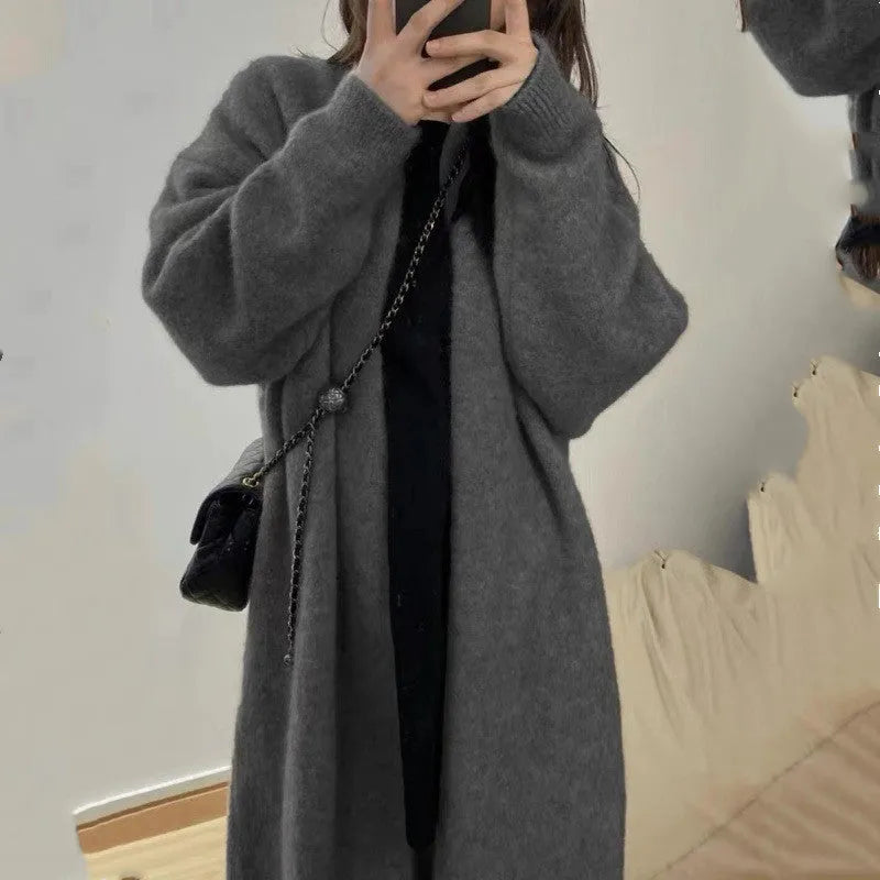 Women's loose knitted cardigan in chenille fabric showing 65cm length and solid colour options