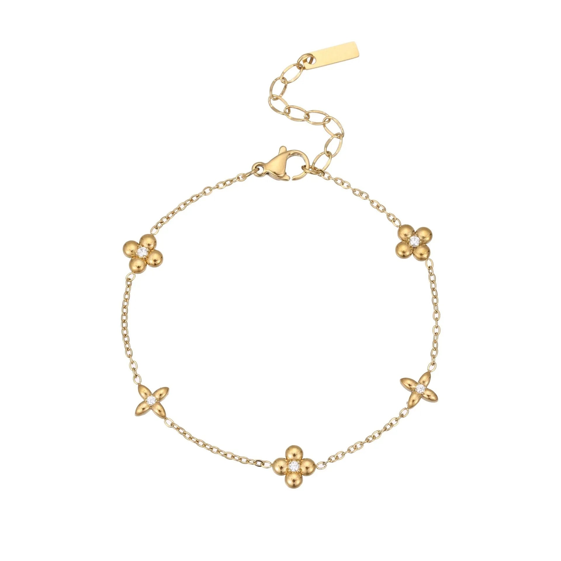 Women's stainless steel bracelet with 18K gold plating and a geometric zircon star pendant on wrist.