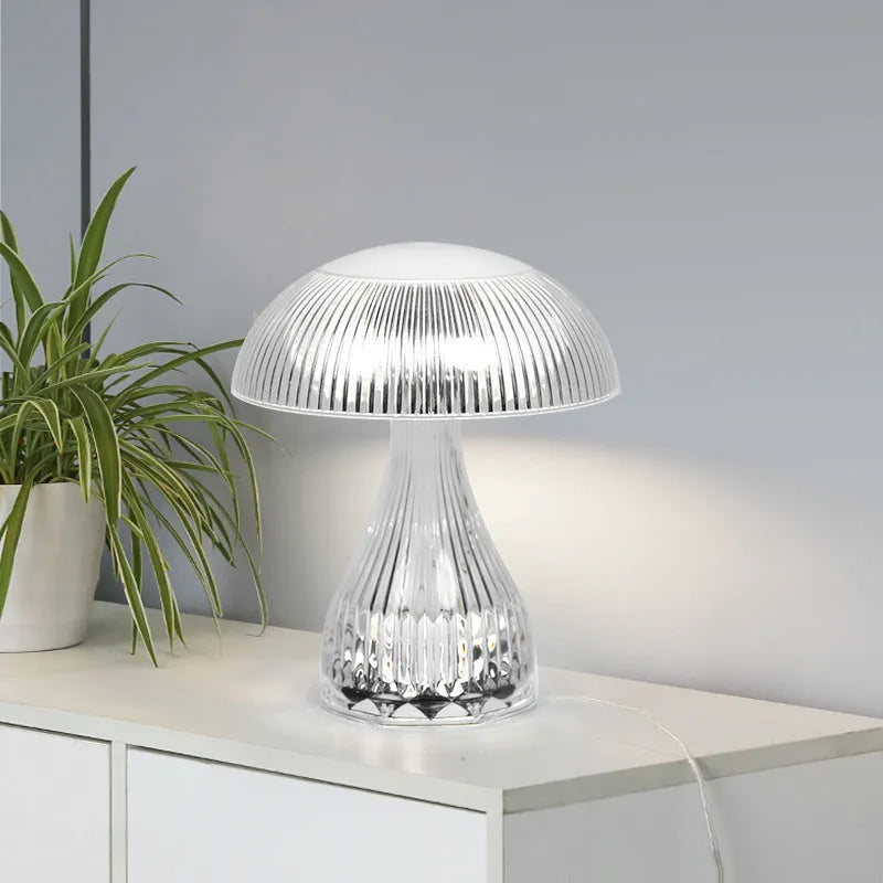 Rechargeable touch night lamp with acrylic body on a plastic base, showing three LED light colours.