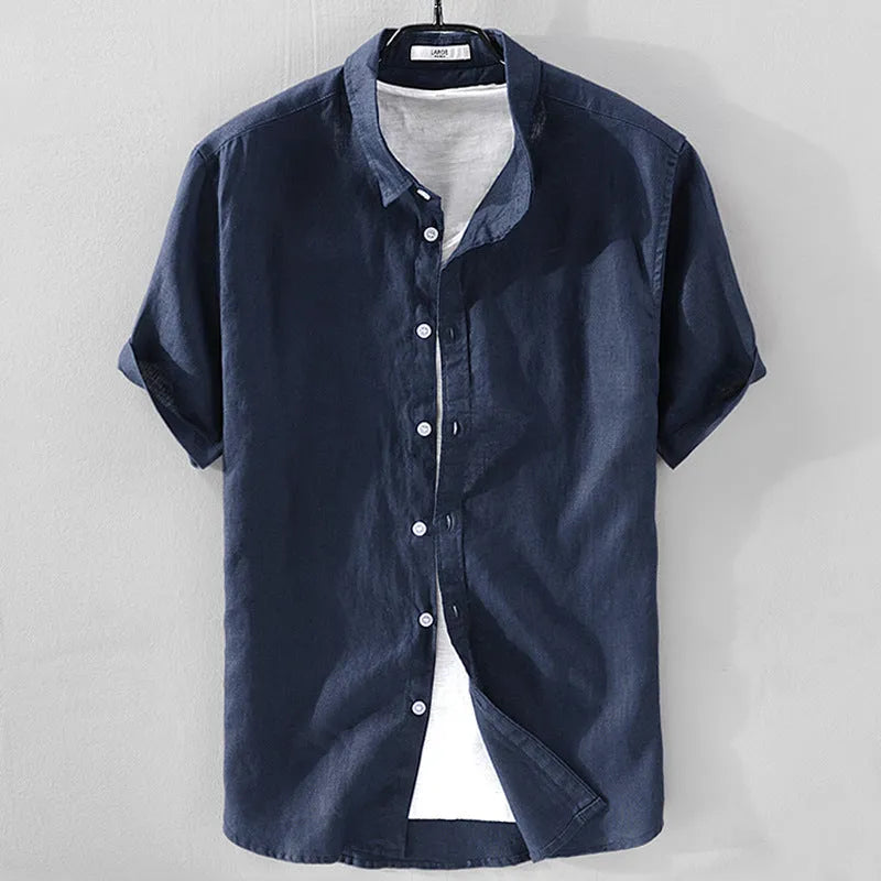 Men's loose fit short sleeve linen shirt in a cotton and linen blend, shown in apricot colour.