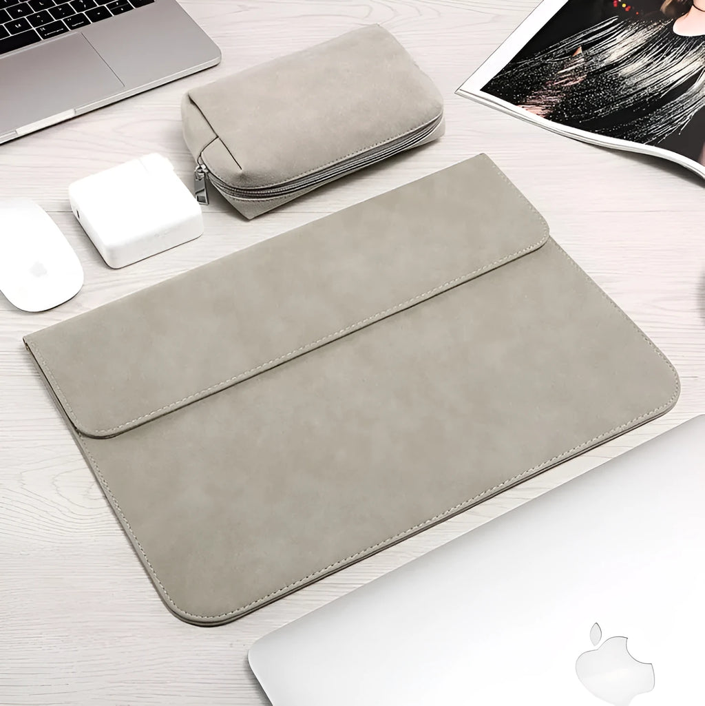 Frosted laptop sleeve in deep grey for MacBook Pro showing zippered opening and abrasive texture