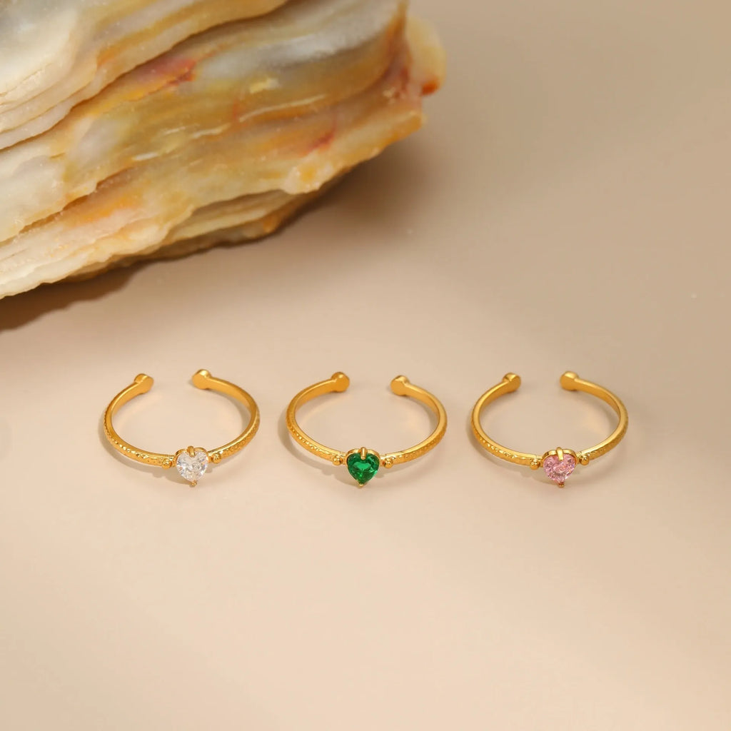Open ended geometric stainless steel ring with a coloured zircon love heart inlay.