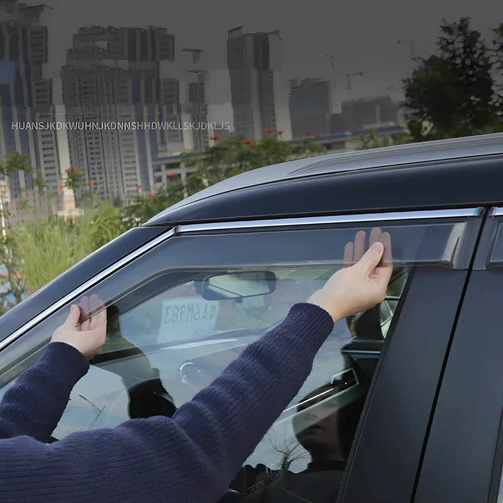 2023 Mitsubishi Outlander black and translucent window deflectors mounted on vehicle