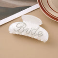 Acrylic hair barrette with sparkling diamond spot drills and English letters in pink or white.