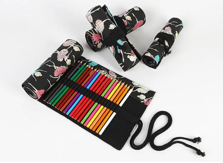 Ballet girl printed canvas roll-up pencil case unrolled to show multiple coloured pencils in slots