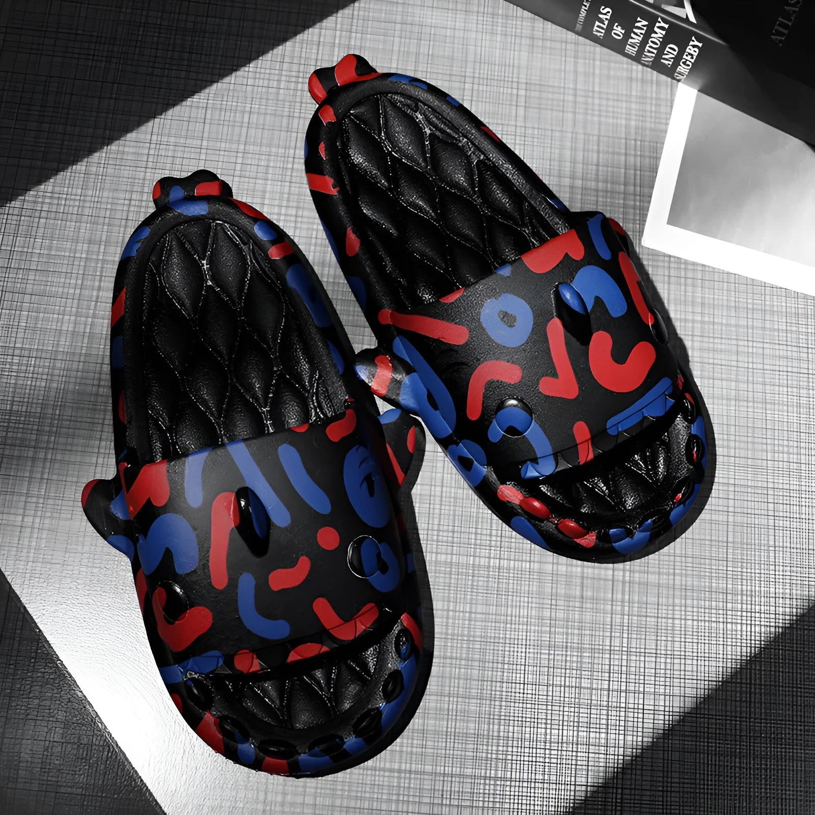 Cute shark design open toe EVA slippers for couples in beige, black, grey, and white colours.