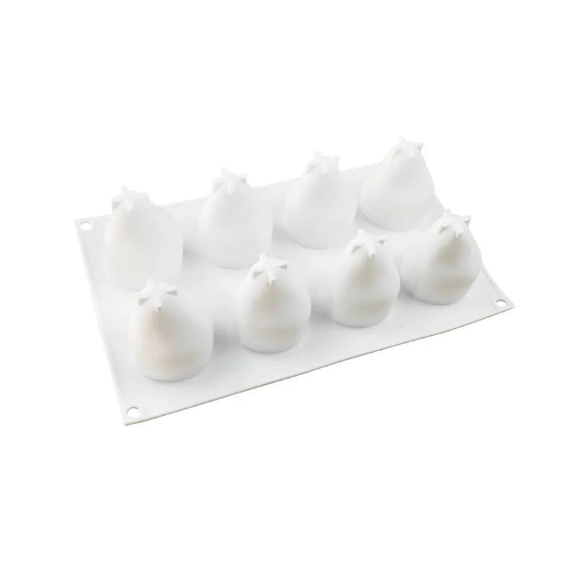 Silicone baking mould with six cavities shaped as pine cones, pineapples, and pears