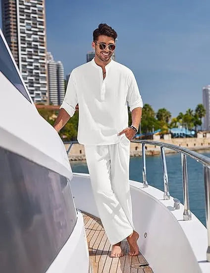 Men's solid colour cotton suit with long sleeve top and trousers in beige, shown laid flat