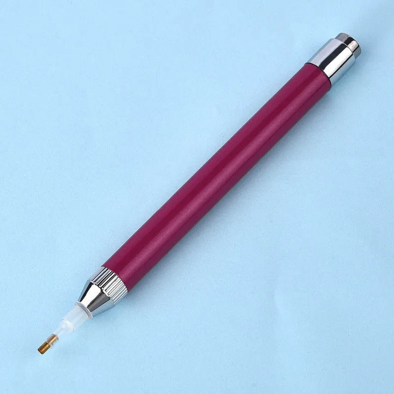 Luminous aluminium alloy drill pen for diamond painting in blue, gold, or red colours