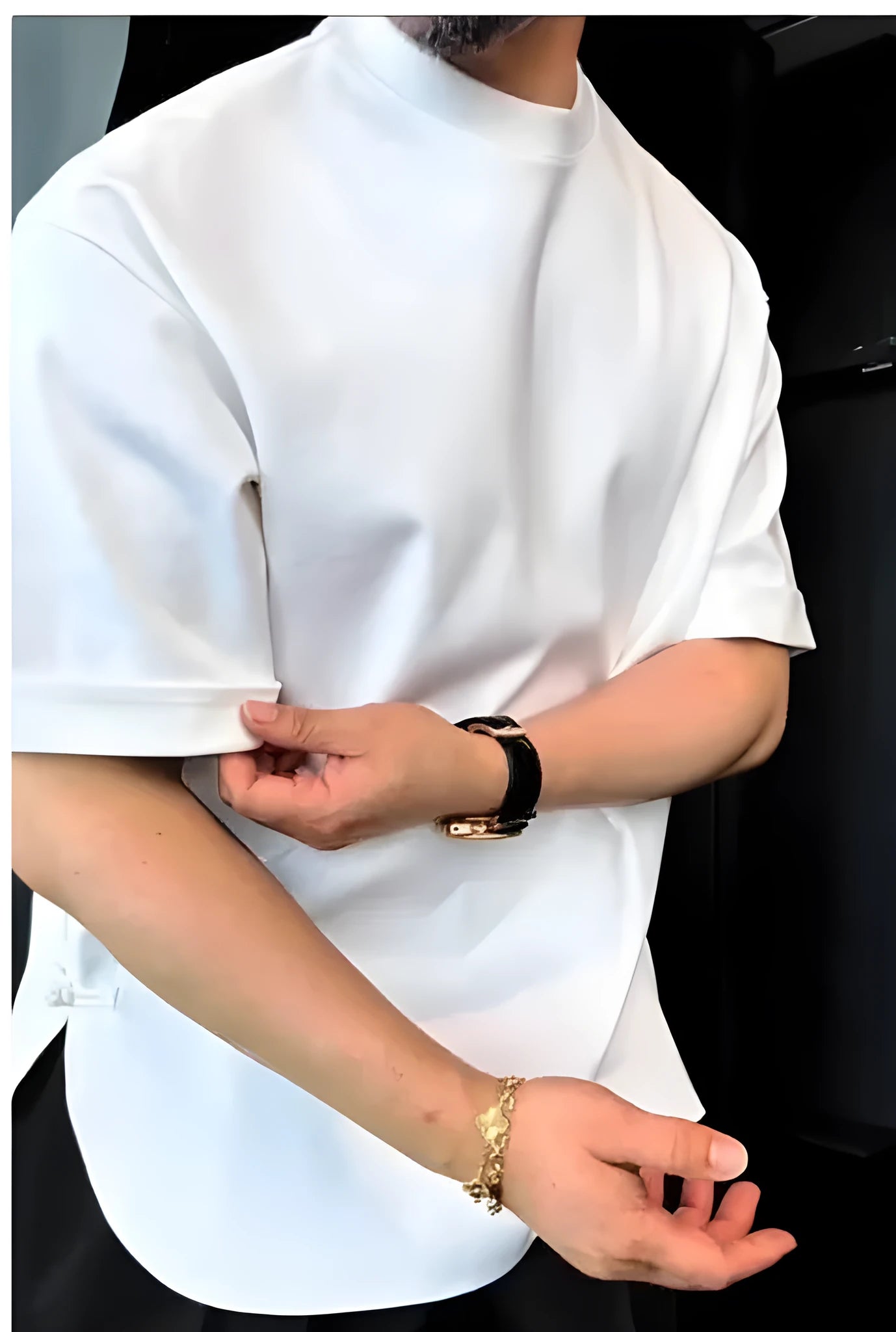Men's white cotton buttoned T-shirt with short sleeves and a flared round hem.