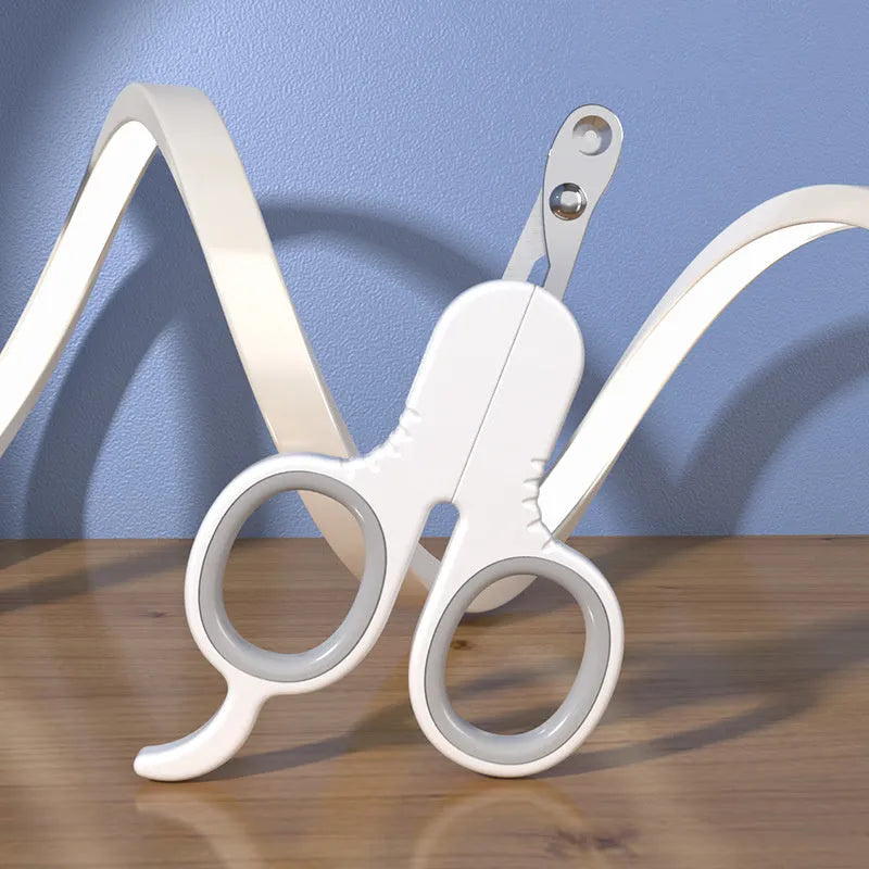 Professional pet nail clippers with curved safety tips and a grey non-slip rubber handle.