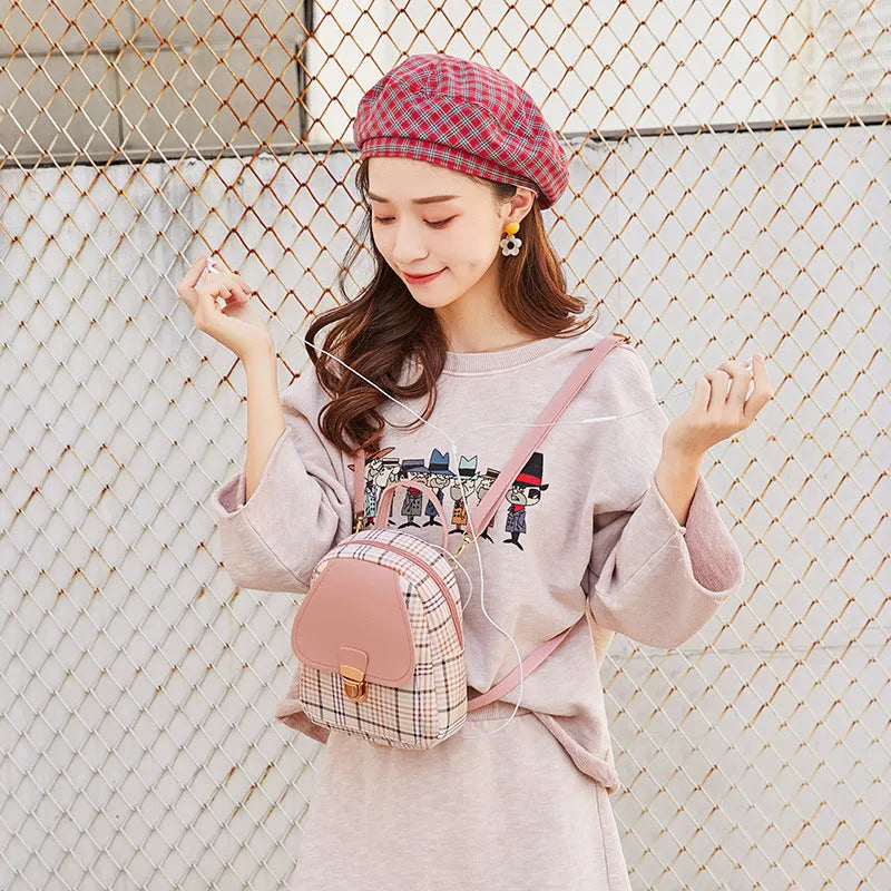 A black PU leather one shoulder diagonal crossbody phone bag for casual use.