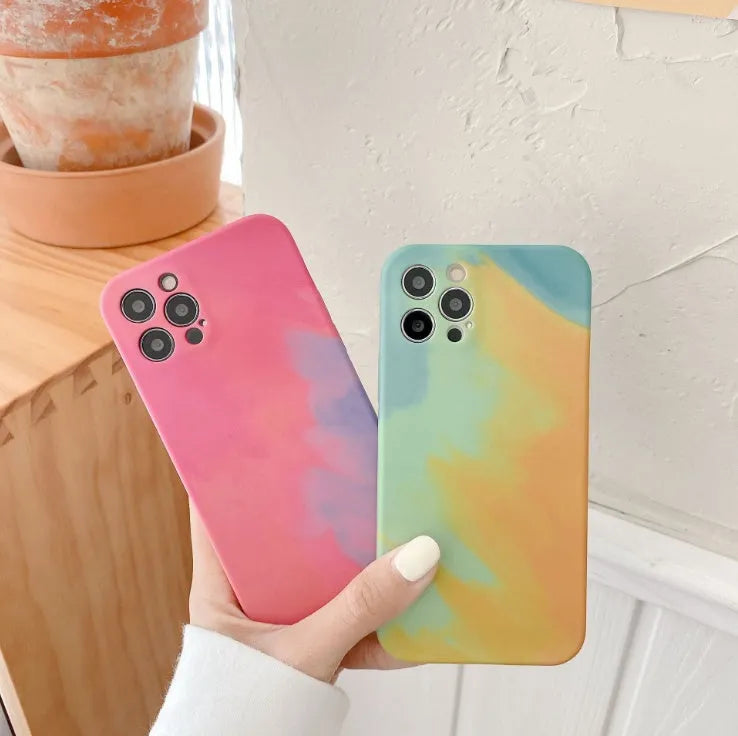 Soft silicone iPhone case with blue and purple geometric gradient abstract pattern.