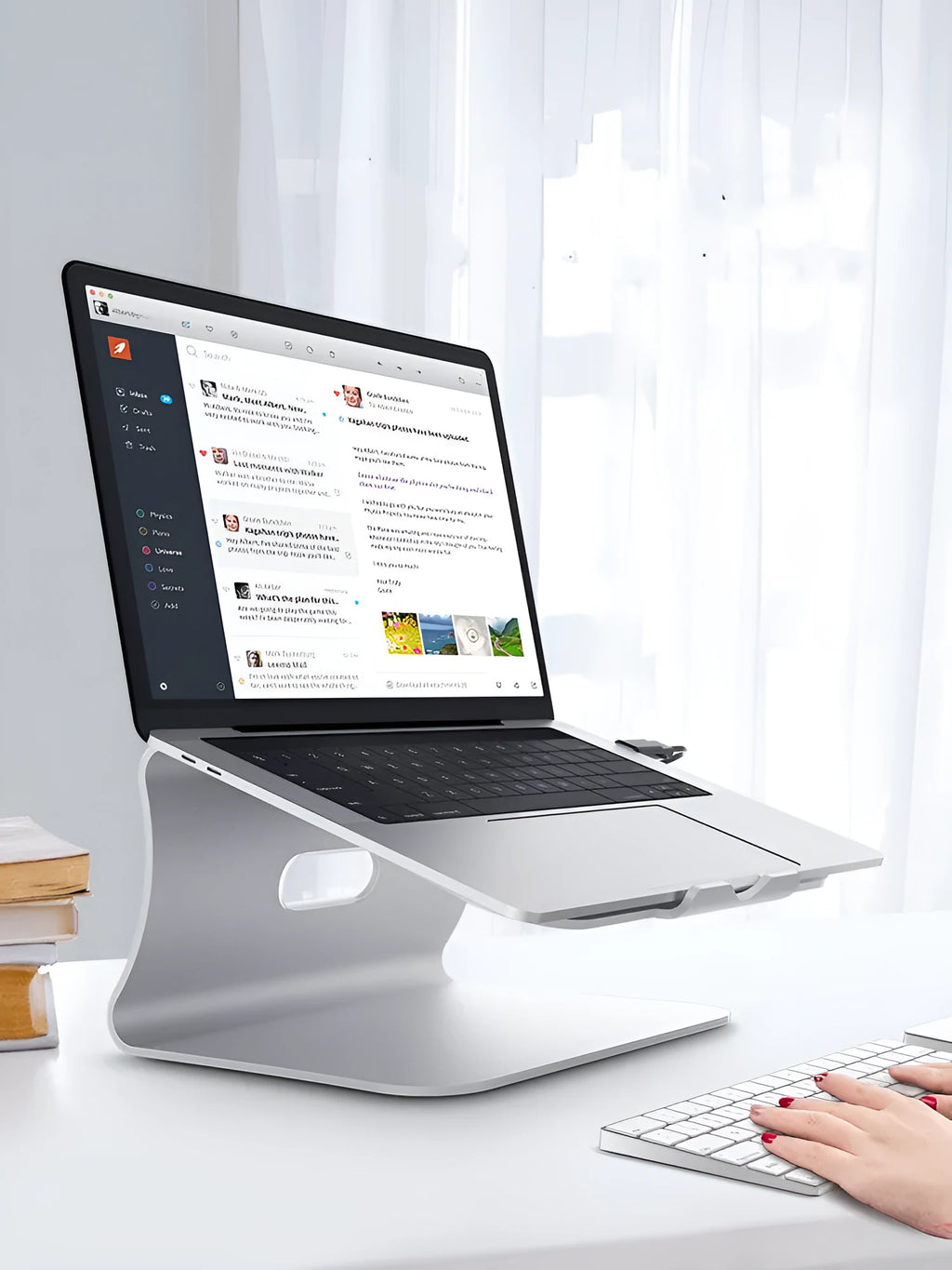 Aluminium alloy rotary laptop cooling stand with strip heat dissipation fins in grey or silver.