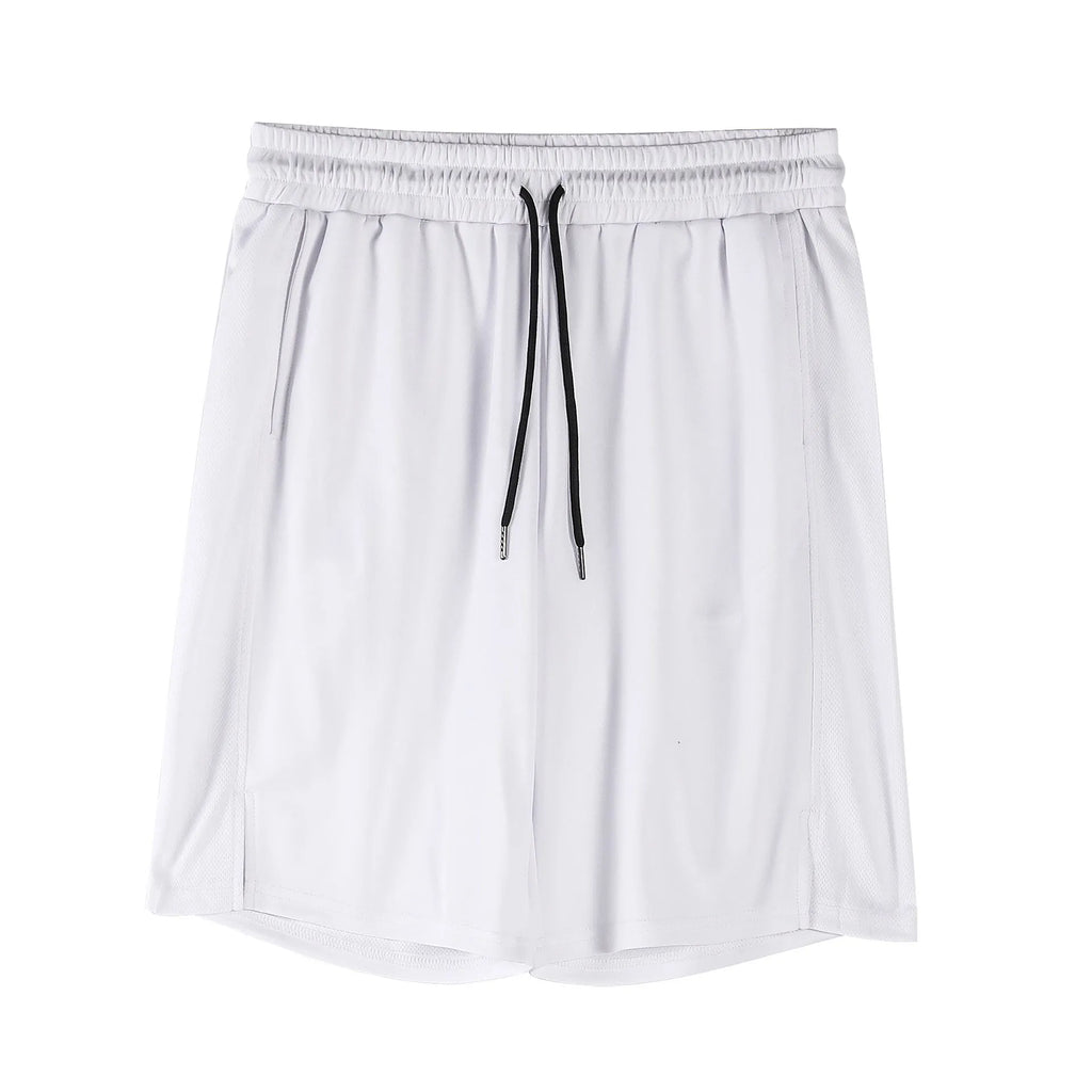 Man wearing black loose-fit quick-dry mesh shorts for summer sports.