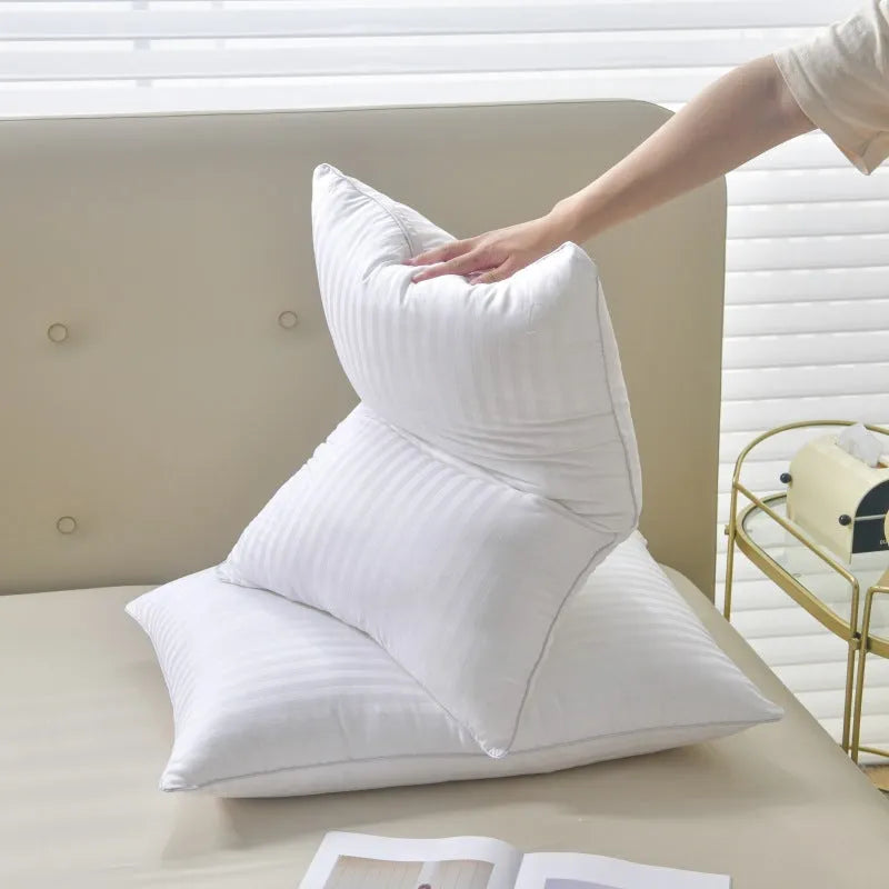 White cotton satin stripe pillow with feather cotton filling, shown in low, medium, and high loft versions.