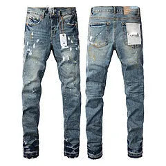 Black slim fit skinny jeans with straight leg, button fly, and manual distressing detail.