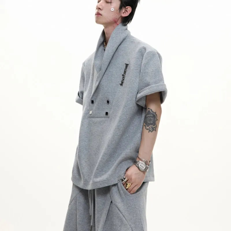 Men's dark grey cotton sports suit with padded shoulder jacket and matching shorts with metal embellishments