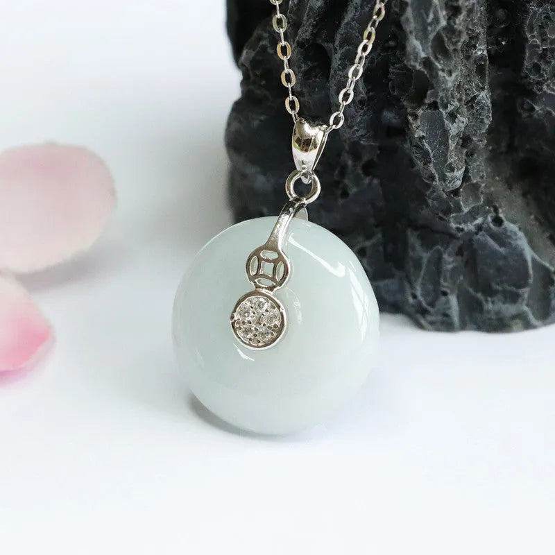 S925 silver inlaid natural emerald round geometric pendant 18x6mm on white background