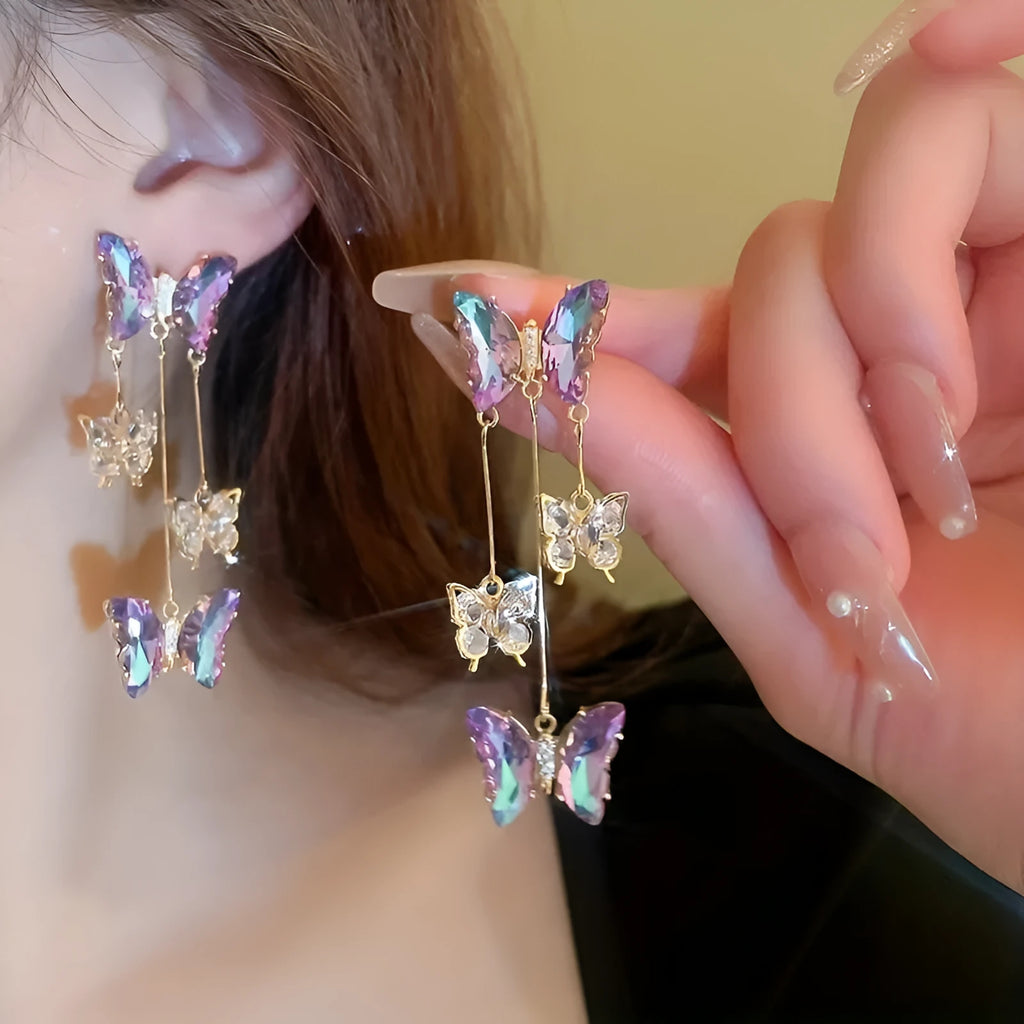 Silver needle colour crystal butterfly earrings with blue-purple electroplated finish and tassel elements