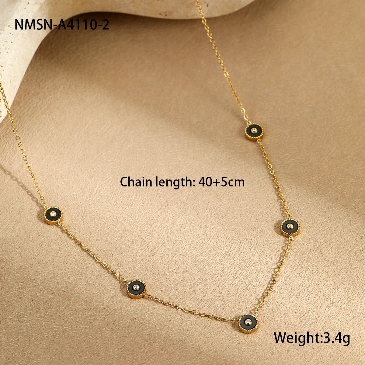 Geometric fritillary design stainless steel bracelet with 18K gold plating and matching necklace