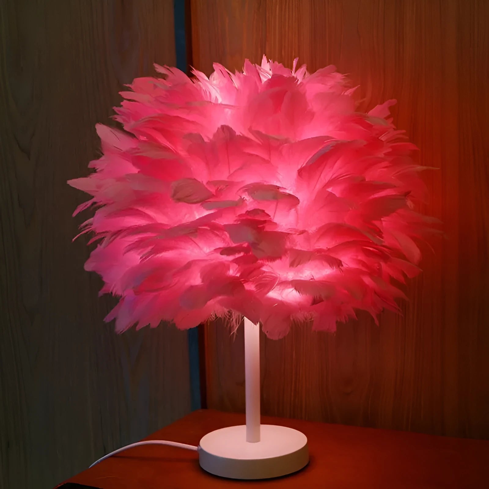 Handmade feather table lamp with metal base, available in white colour, approximately 30cm diameter and 40cm height