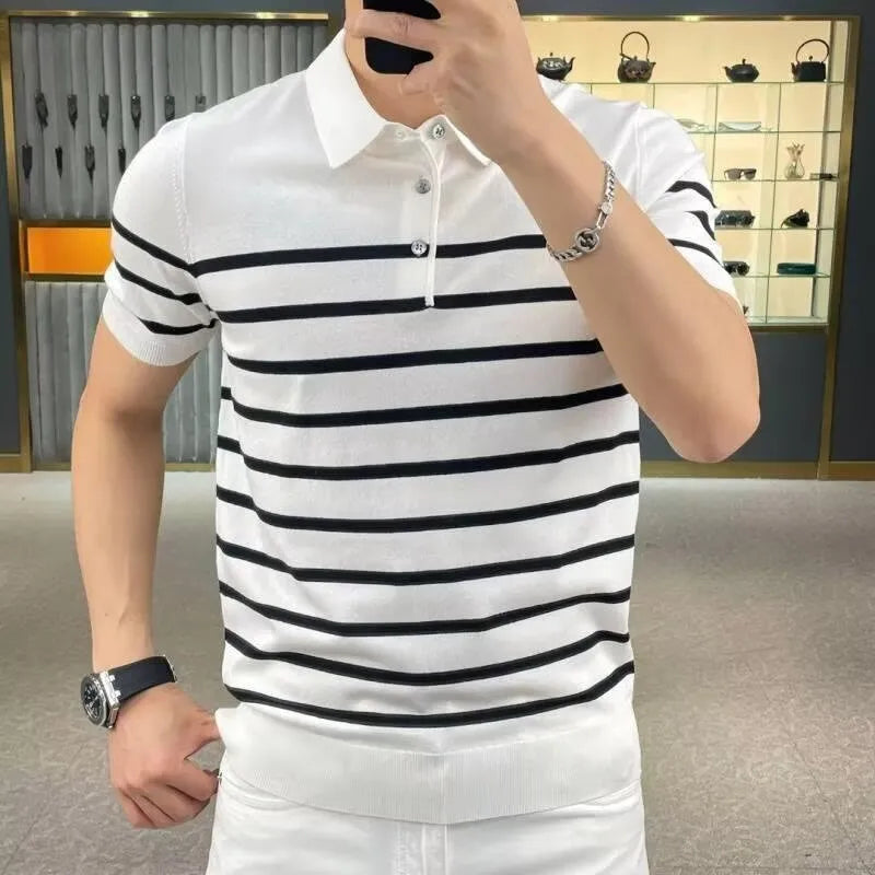 Black and white striped men's knit t-shirt with a lapel collar, laid flat.