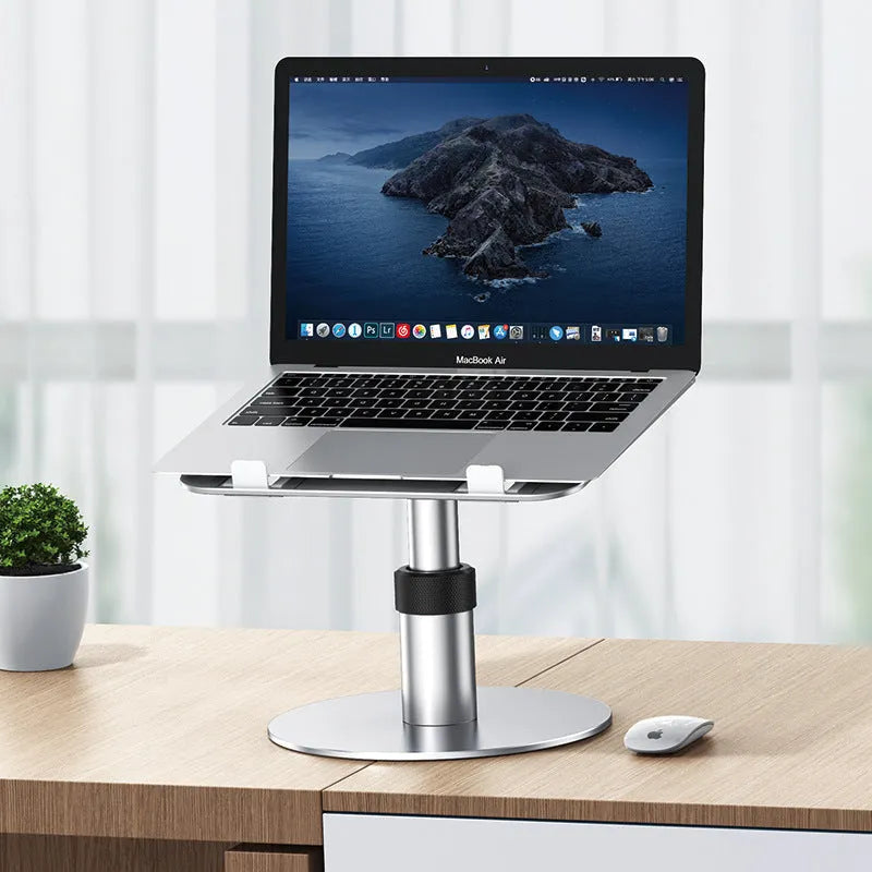 Silver adjustable aluminium alloy car laptop stand with rotating base and non-slip support plate.
