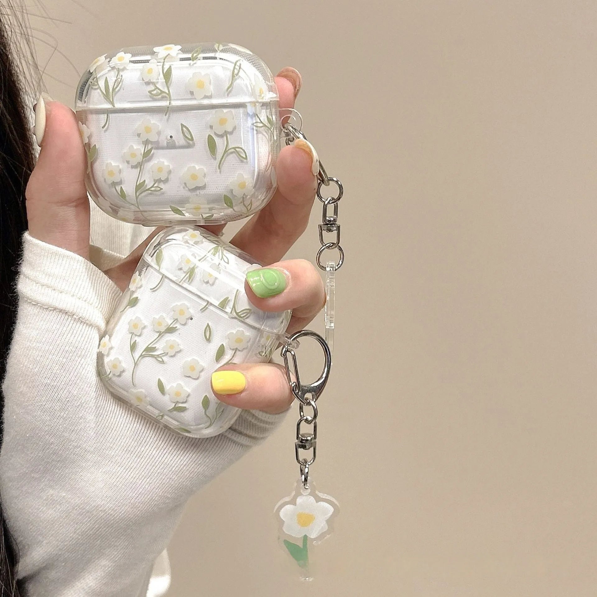 White floral transparent TPU protective case for Apple AirPods charging case.