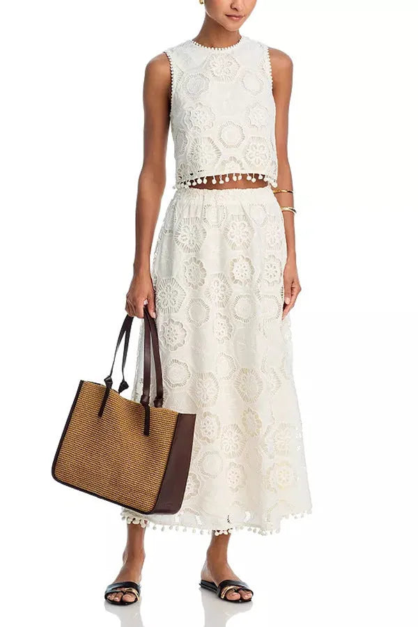 White women's sleeveless top and long skirt suit with retro embroidery design