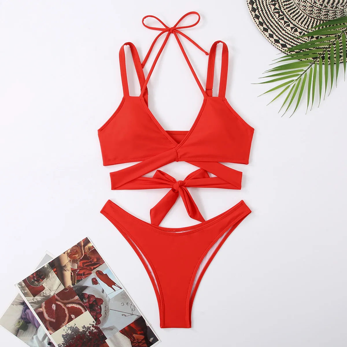 Women's solid colour strap bikini swimsuit in briefs style showing black, blue, red, rose red, and white colour options