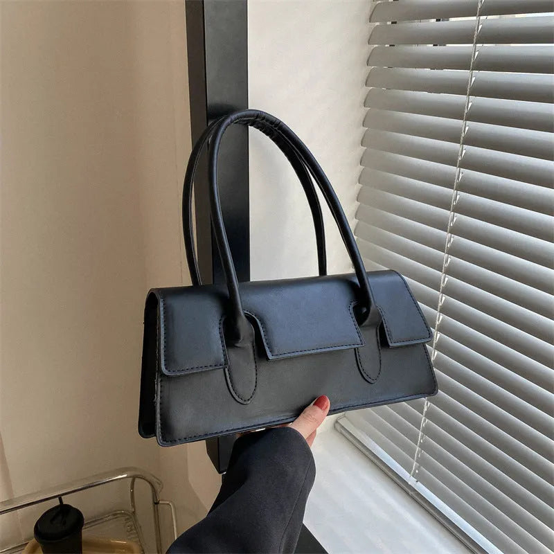 Women's small square shoulder bag in PU leather with horizontal rectangle shape and stitching detail