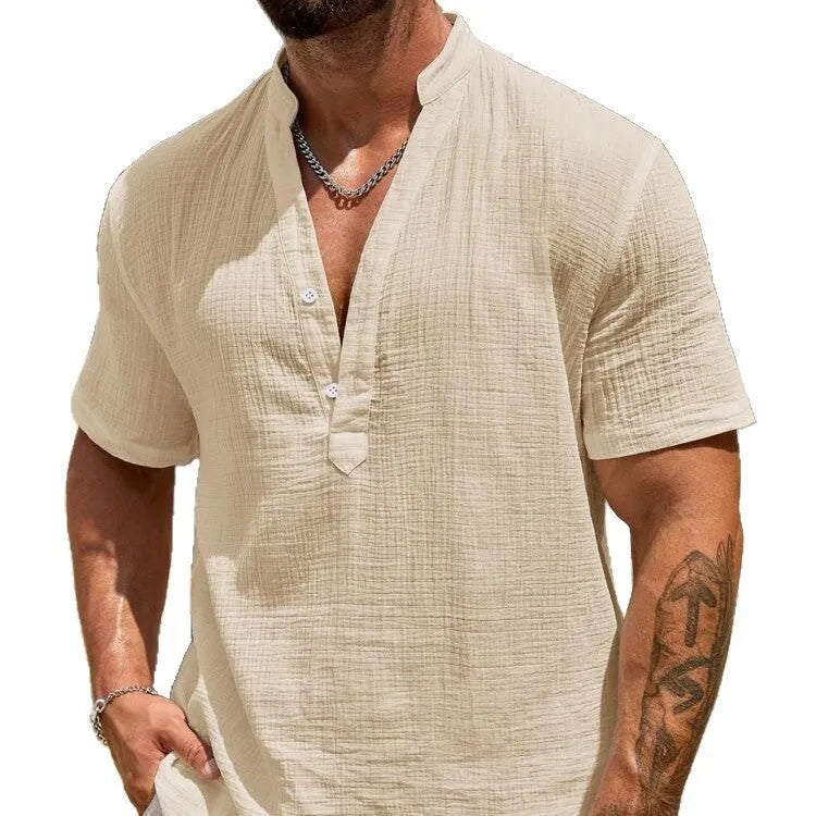 Men's solid colour stand collar short-sleeved shirt with slit detail in light blue.