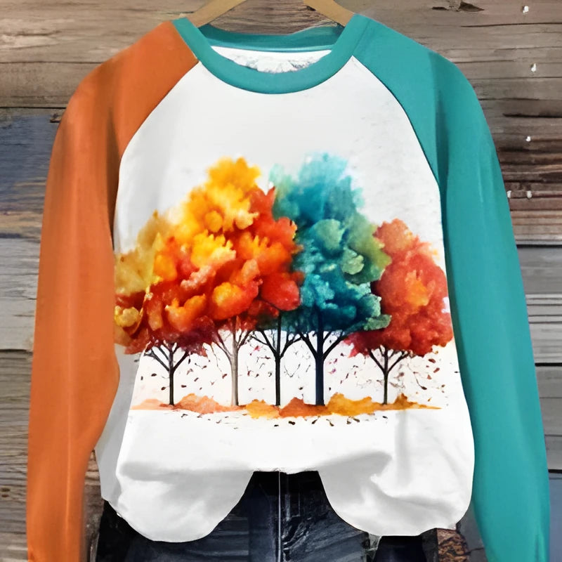 Green women's hoodie with a 3D cartoon character print on the front.