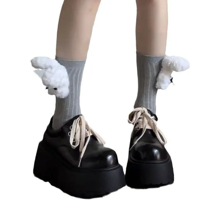 Women's matte black lace-up shoes with a chunky 6-8cm heel and thick rubber sole.