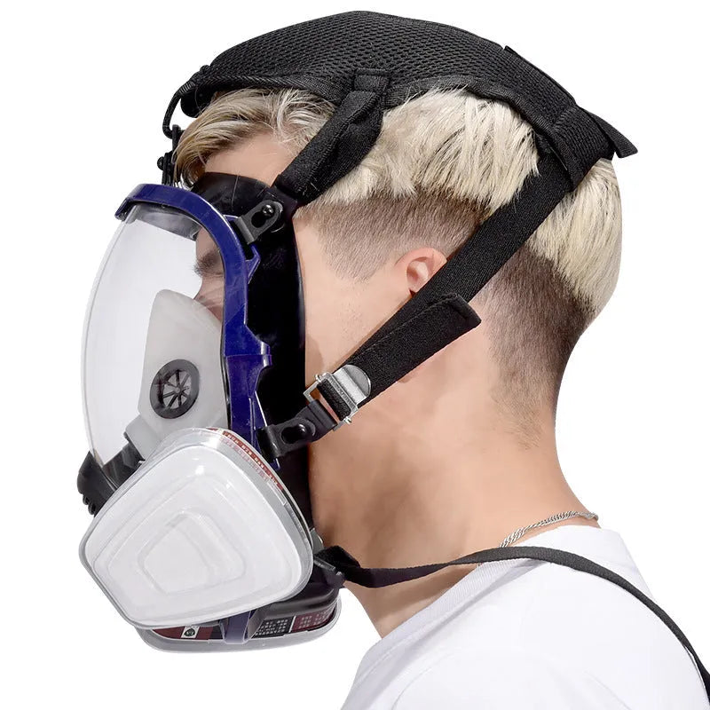 Blue edge spherical full-face gas mask with trapezoidal canister and activated carbon filtration system
