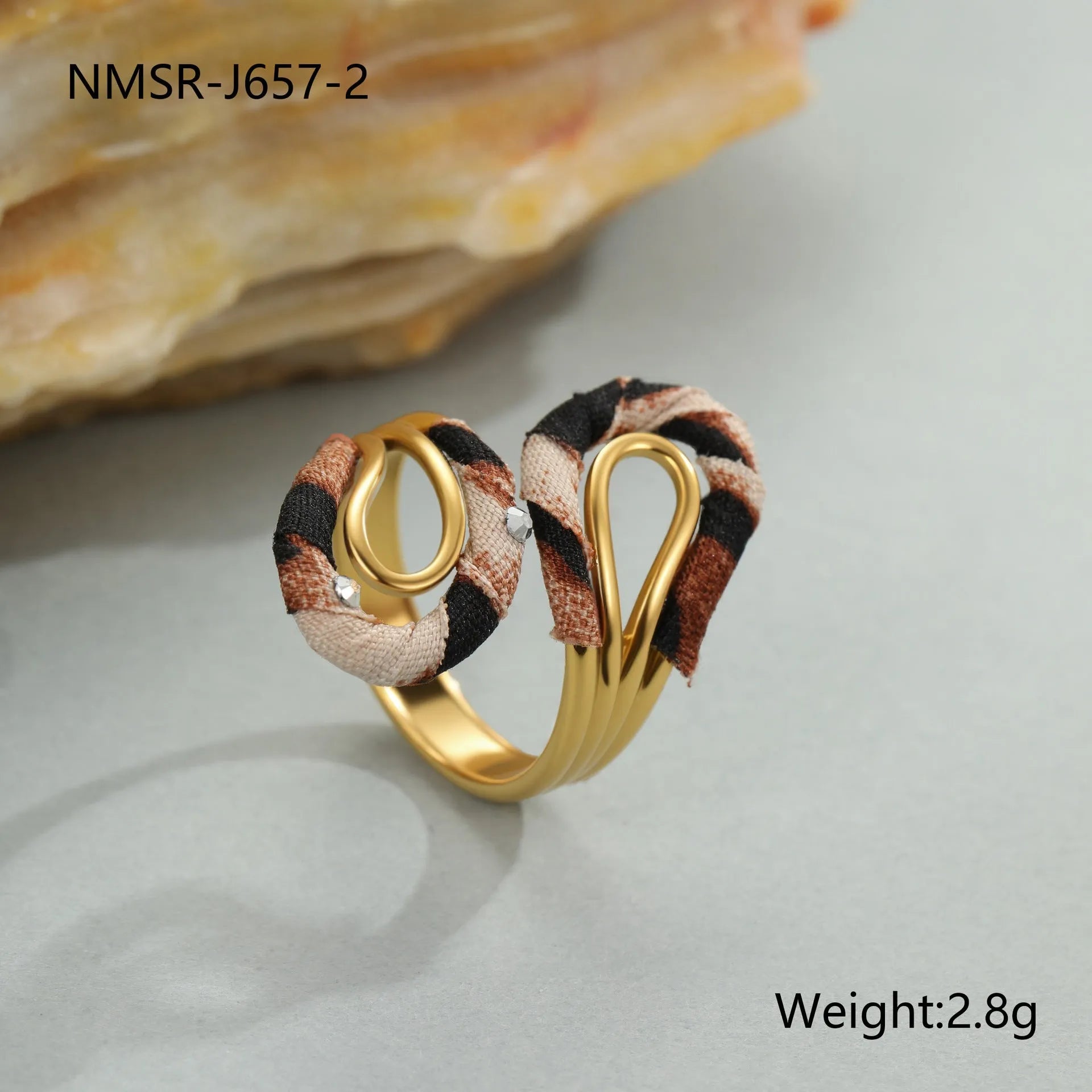 Geometric stainless steel open mouth ring with leopard print patterns in heart and star shapes