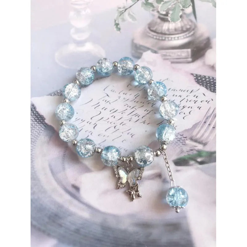Handmade Chinese style glass bracelet with bamboo joint beads in a red Lvzhu Duobao design.