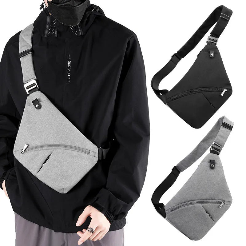 Men's black Oxford cloth chest bag worn across shoulder with letter detail