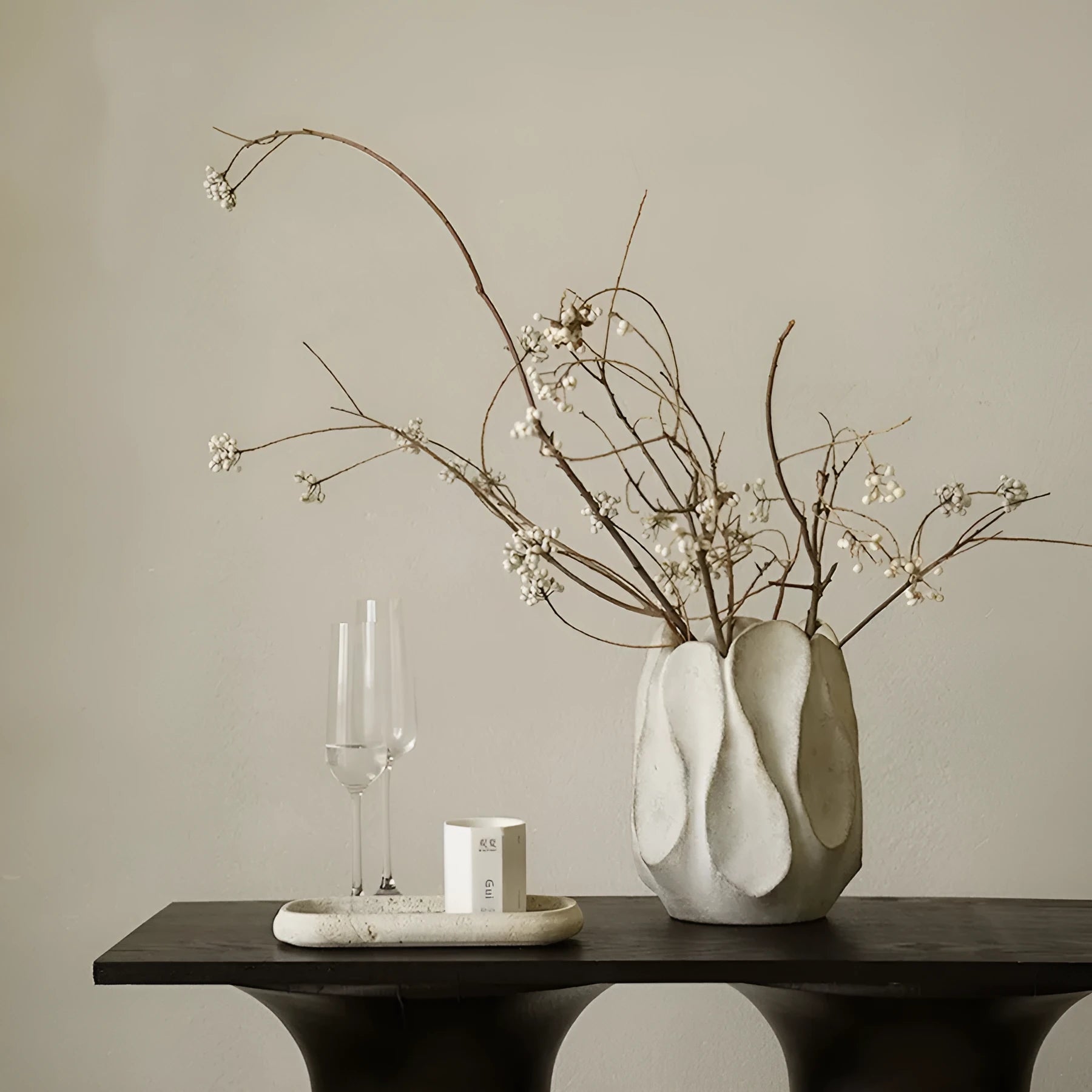 Irregular ceramic art vase in magnesium clay with resin decorative elements for floral arrangements
